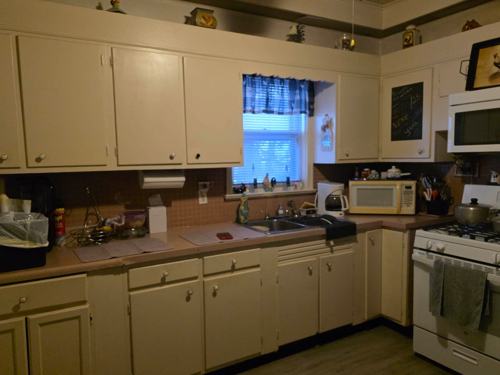 274 Park Street Bridgeport, CT 06608 - Photo 22 of 28 a kitchen with stainless steel appliances granite countertop a sink a stove and cabinets