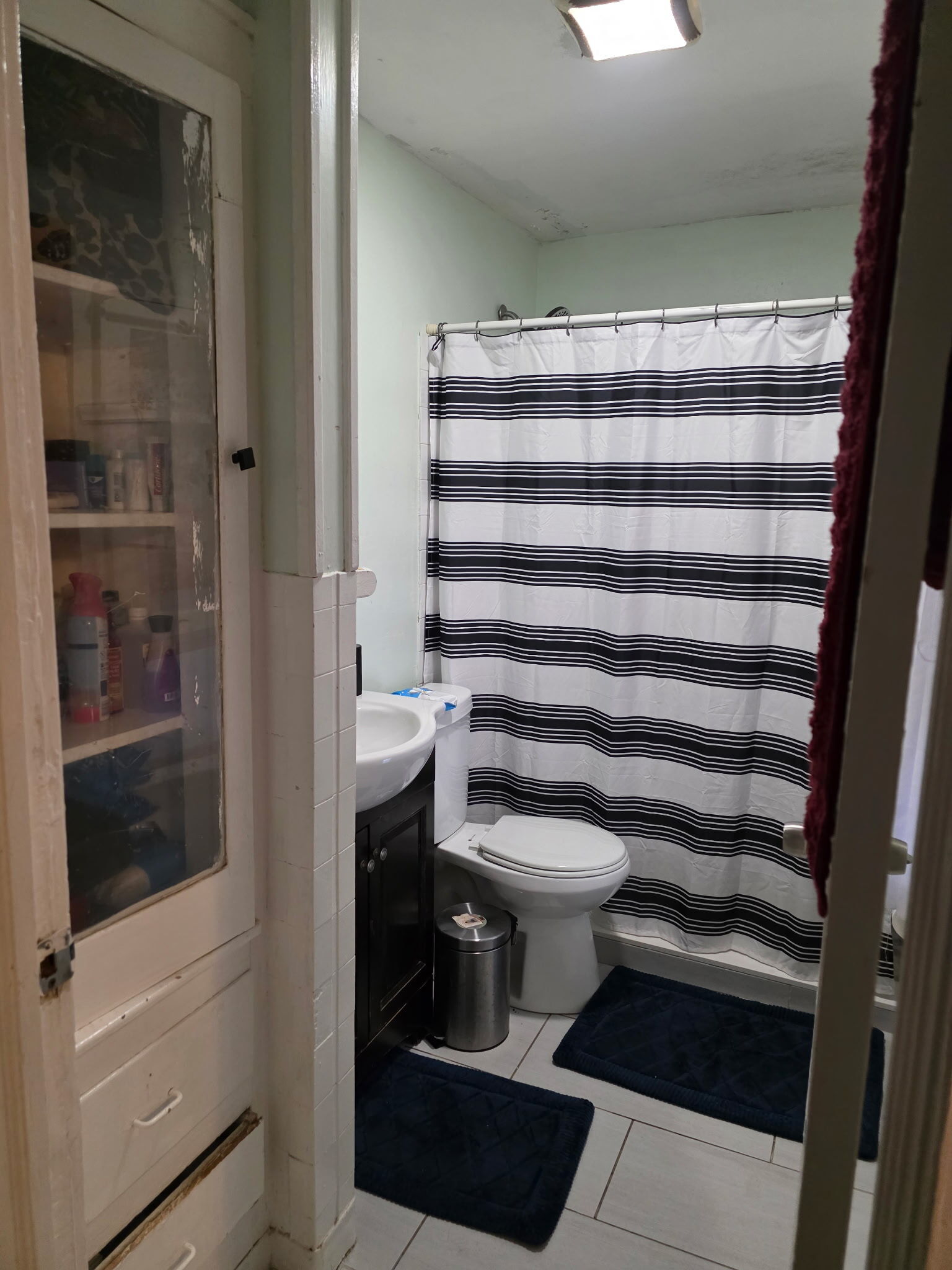 274 Park Street Bridgeport, CT 06608 - Photo 3 of 28 a bathroom with a toilet and a shower