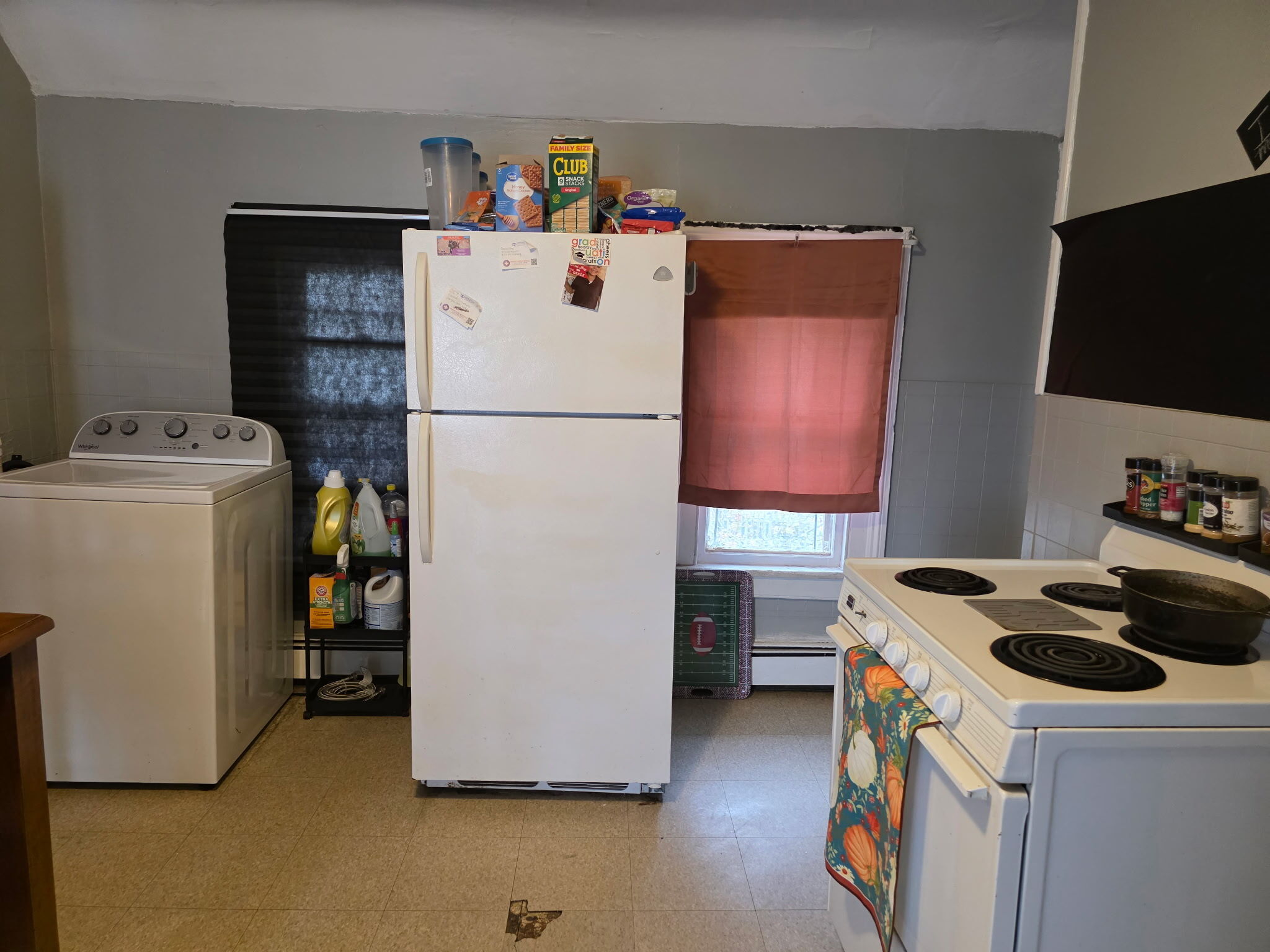 274 Park Street Bridgeport, CT 06608 - Photo 5 of 28 a utility room with refrigerator and washer