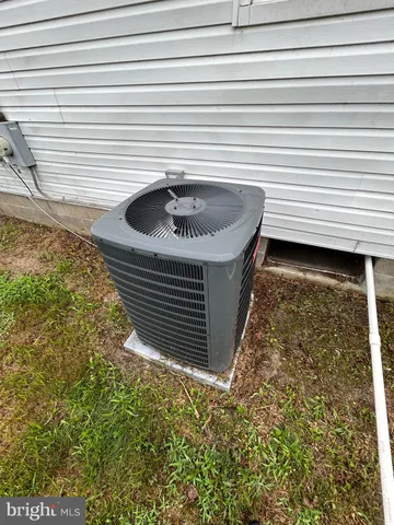 a bathroom with a sink and a window