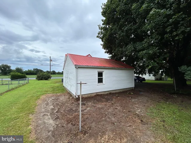 a house with yard in front of it