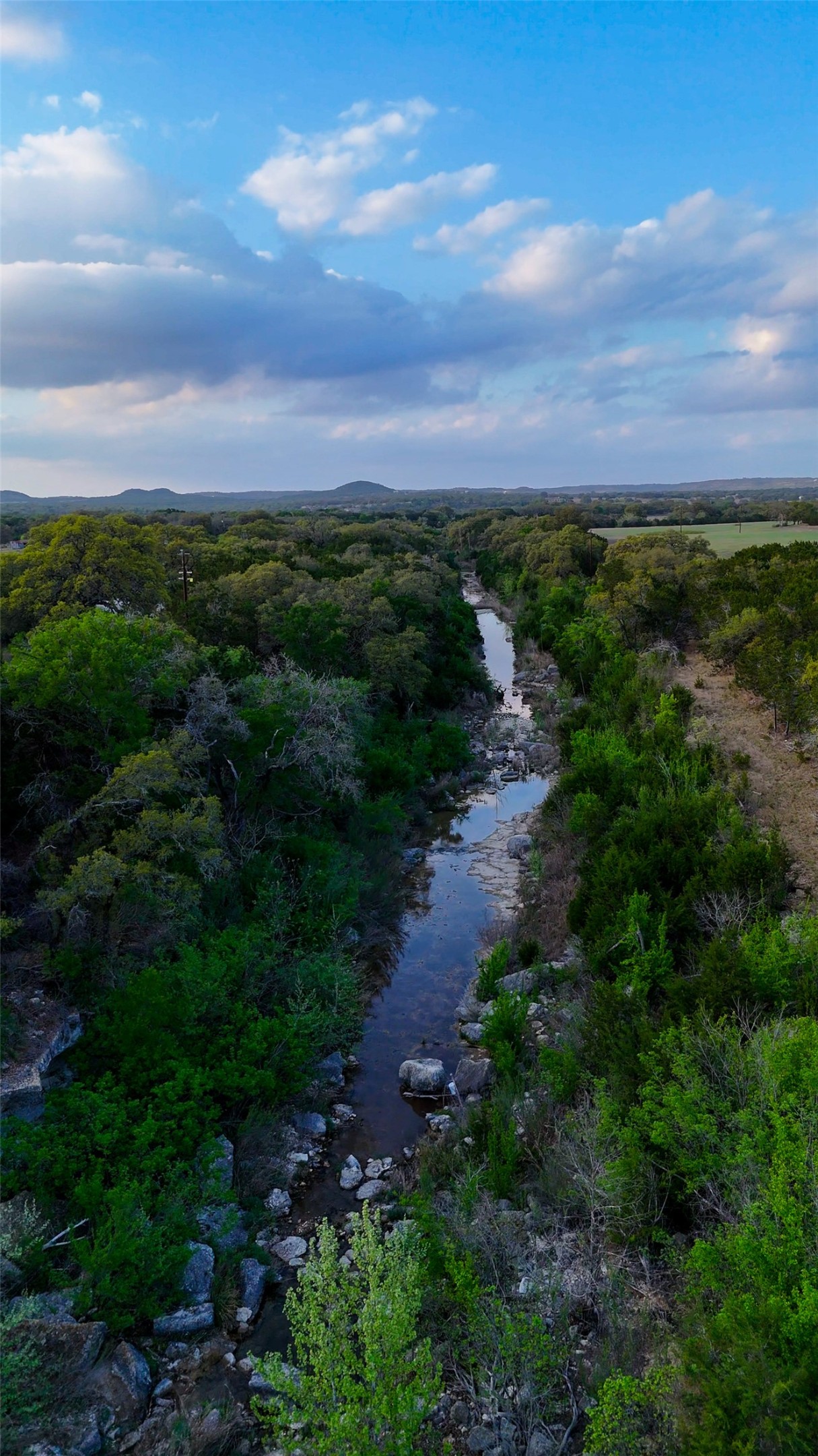 1294 Crabapple Road Blanco, TX 78606 - Photo 29 of 38 840 feet of Crabapple Creek creates the eastern boundary of the homestead