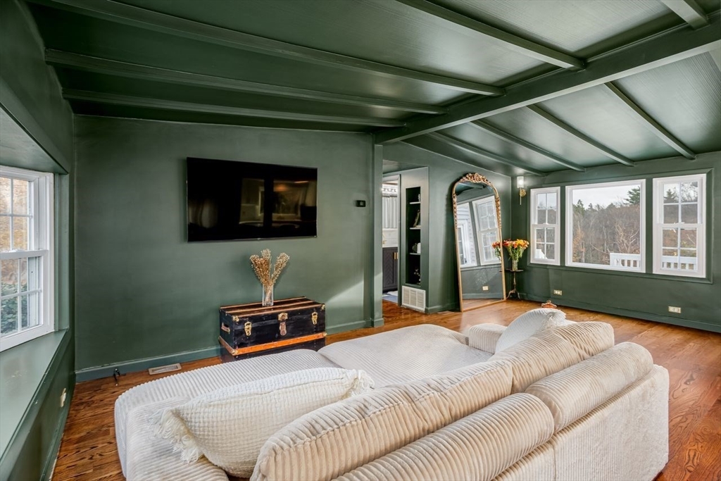 155 County Road Ashby, MA 01431 - Photo 10 of 38 a bedroom with a bed a television and a large window