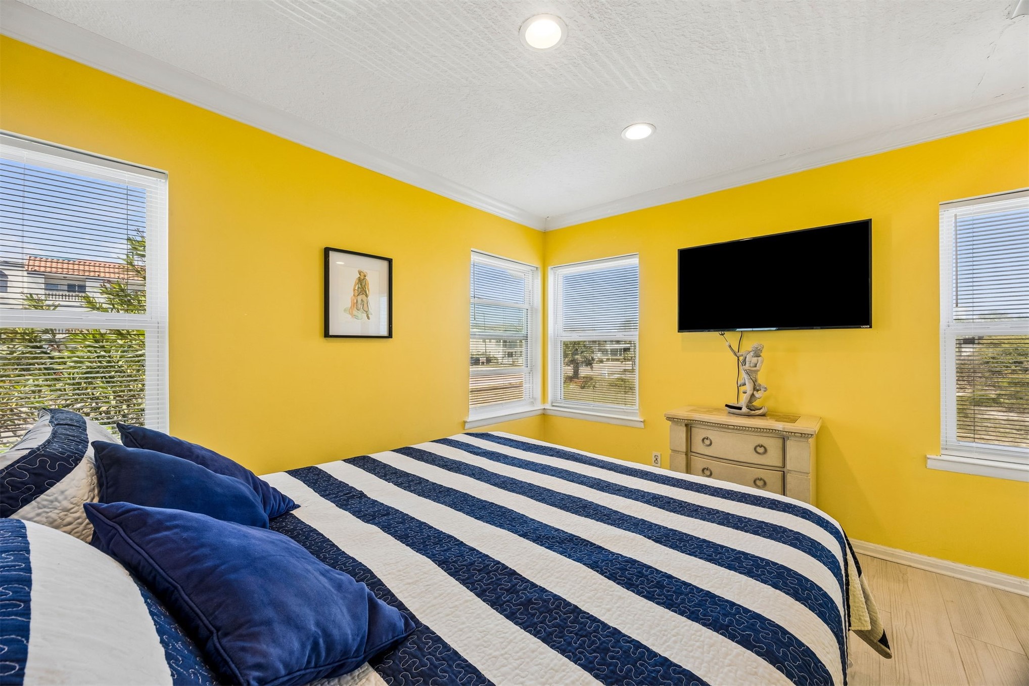 1990 South Fletcher Avenue Fernandina Beach, FL 32034 - Photo 29 of 47 a bedroom with a bed and a flat screen tv