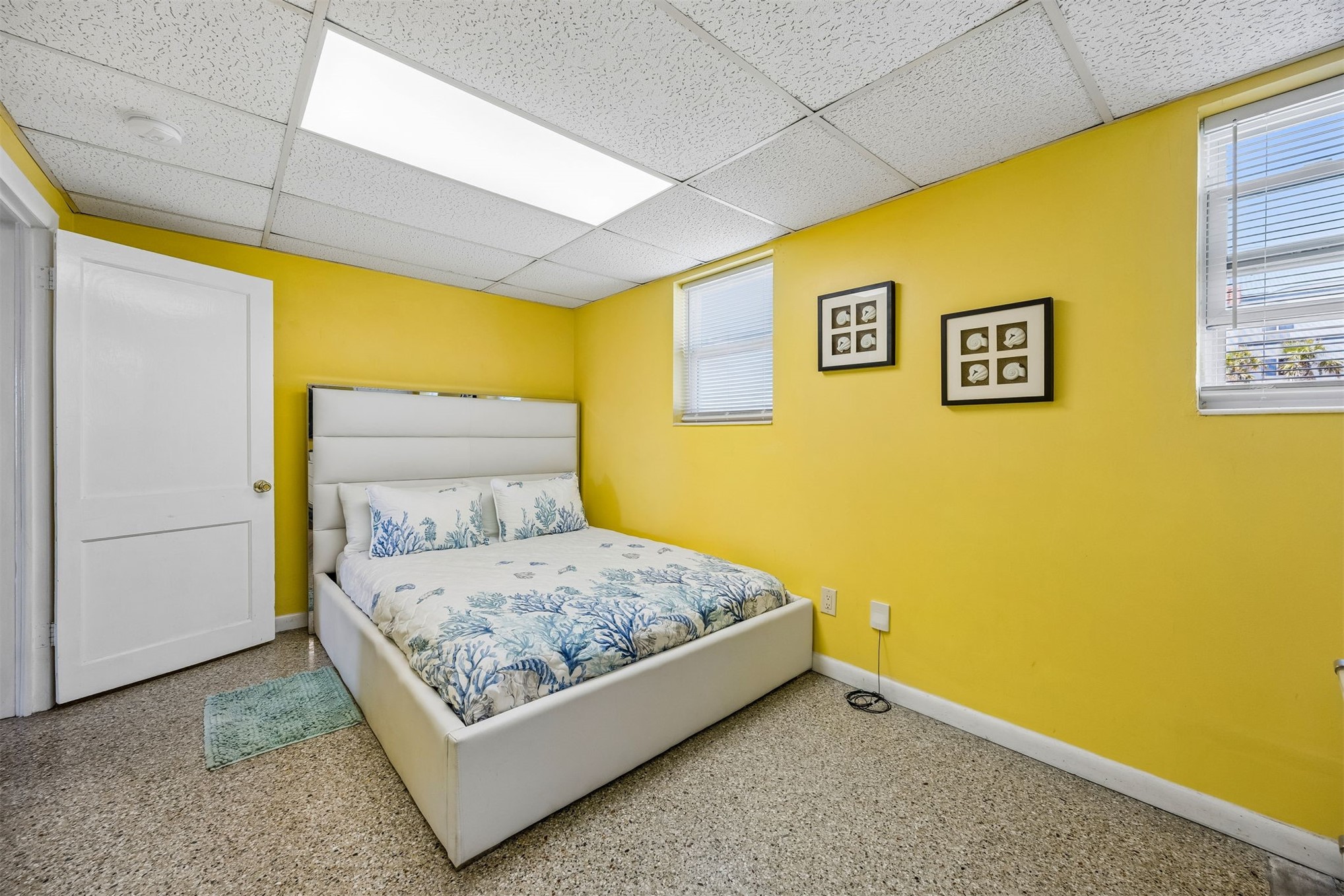 1990 South Fletcher Avenue Fernandina Beach, FL 32034 - Photo 45 of 47 a bedroom with a bed and wooden floor