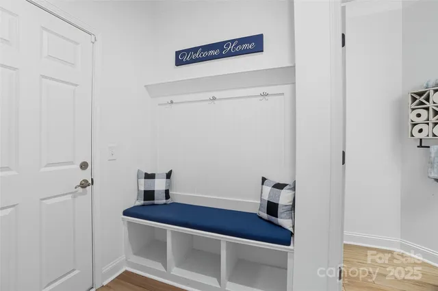 a room with a table and a mirror