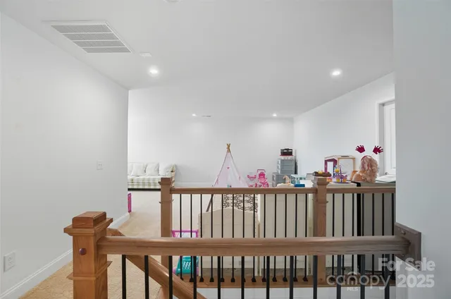 a view of a room with furniture and toys