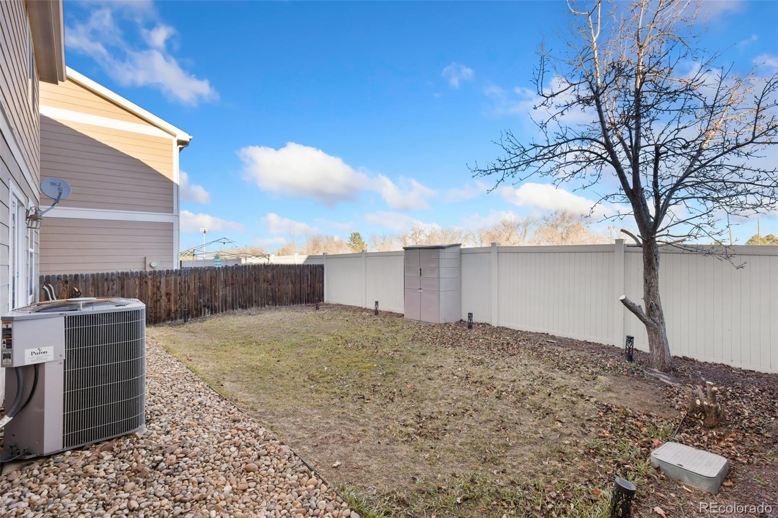 10696 Upper Ridge Road Longmont, CO 80504 - Photo 18 of 25 a view of a backyard of a house