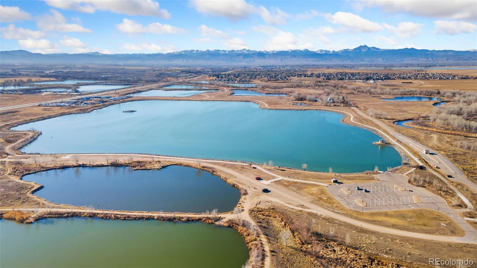 10696 Upper Ridge Road Longmont, CO 80504 - Photo 25 of 25 a view of a swimming pool and an ocean view