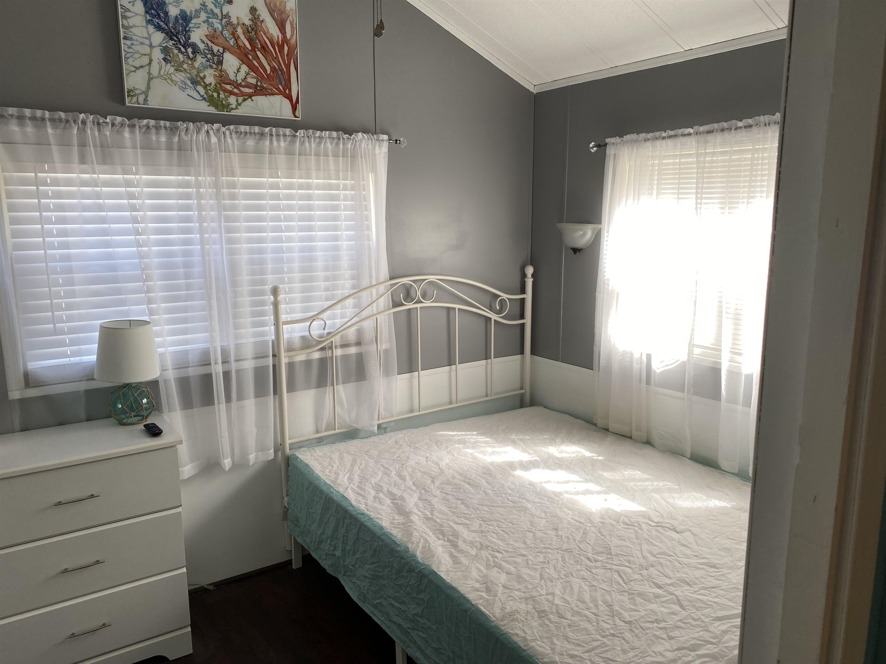 515 Corsons Tavern Road Ocean View, NJ 08230 - Photo 11 of 18 a bathroom with a granite countertop sink a toilet and shower