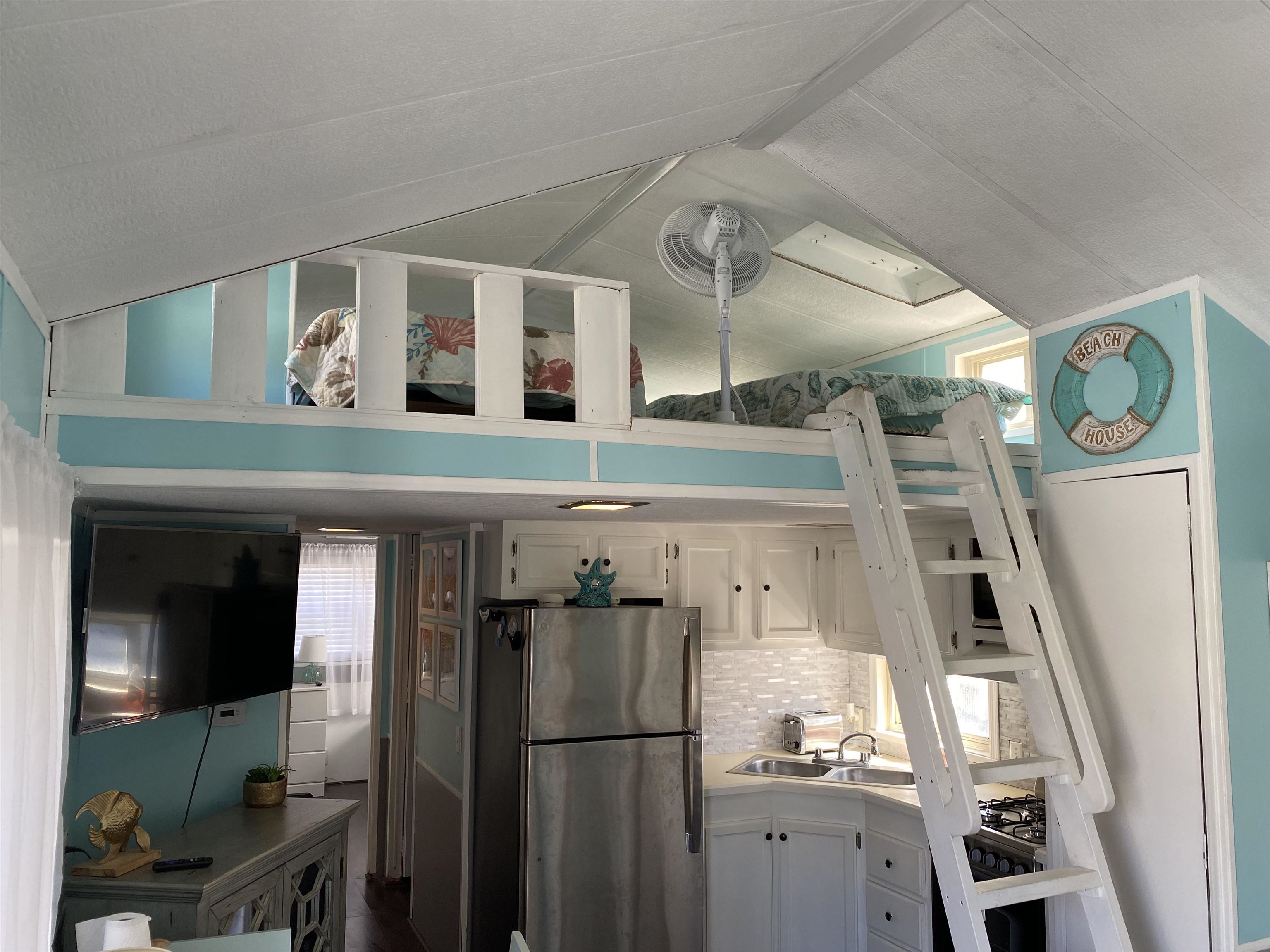 515 Corsons Tavern Road Ocean View, NJ 08230 - Photo 6 of 18 a front view of a house with a wooden floor