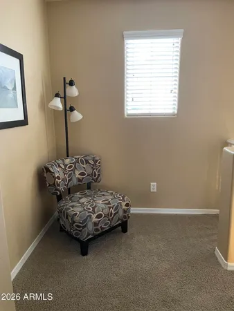 a room with a bed and a window