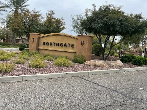 a view of a park that has a sign board