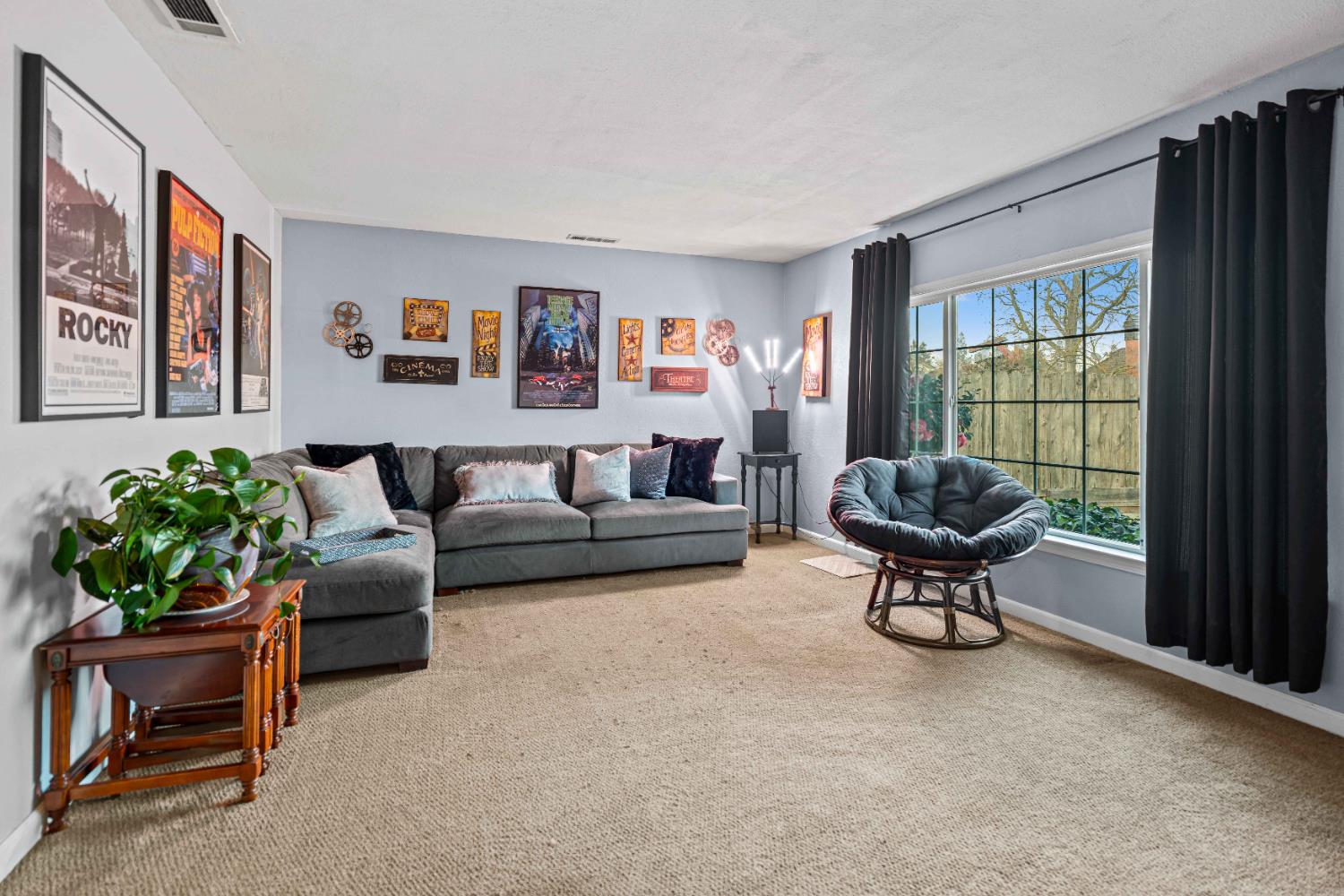 3913 Peacock Lane Modesto, CA 95356 - Photo 4 of 21 a living room with furniture and a potted plant