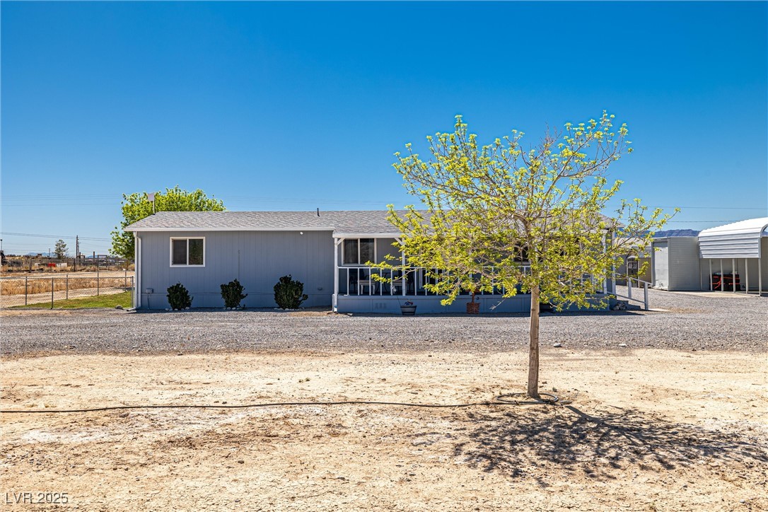 101 West Pechstein Road Pahrump, NV 89060 - Photo 1 of 33 View of front of home.