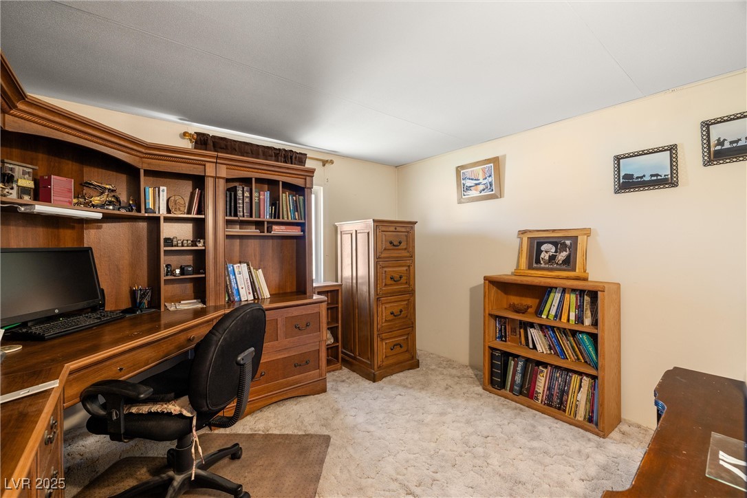 101 West Pechstein Road Pahrump, NV 89060 - Photo 23 of 33 Home office featuring carpet.