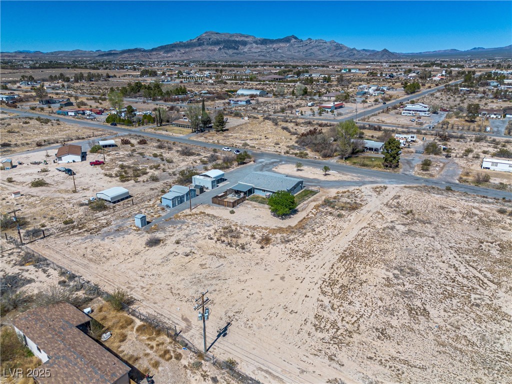 101 West Pechstein Road Pahrump, NV 89060 - Photo 33 of 33 Birds eye view of property featuring a desert view and a mountain view.