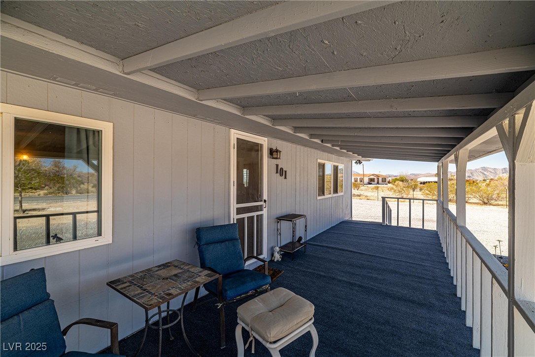 101 West Pechstein Road Pahrump, NV 89060 - Photo 4 of 33 View of patio featuring a mountain view.