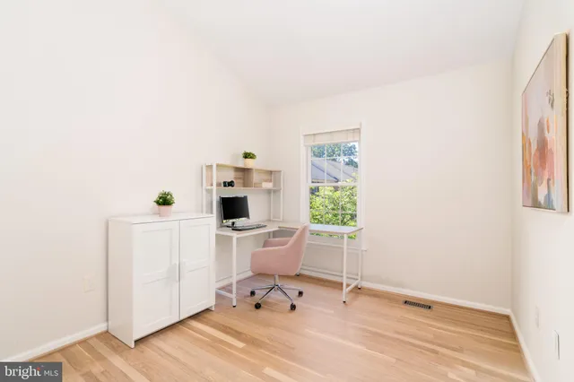 a view of livingroom with furniture and floor to ceiling window