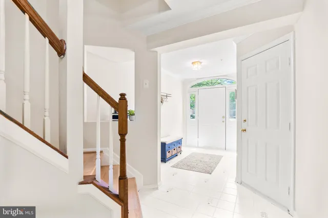 a view of an entryway with staircase