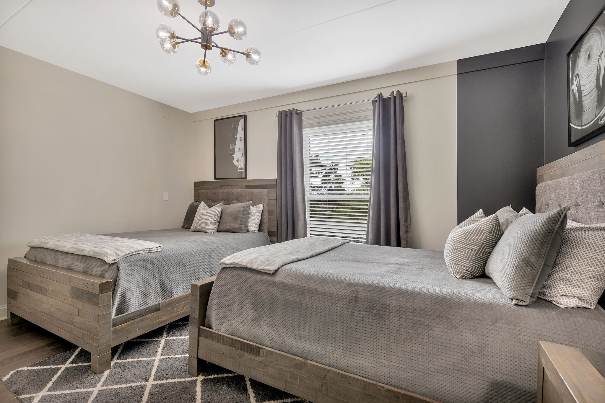 11 Music Square East, Unit 203 Nashville, TN 37203 - Photo 12 of 26 a bedroom with a bed and window