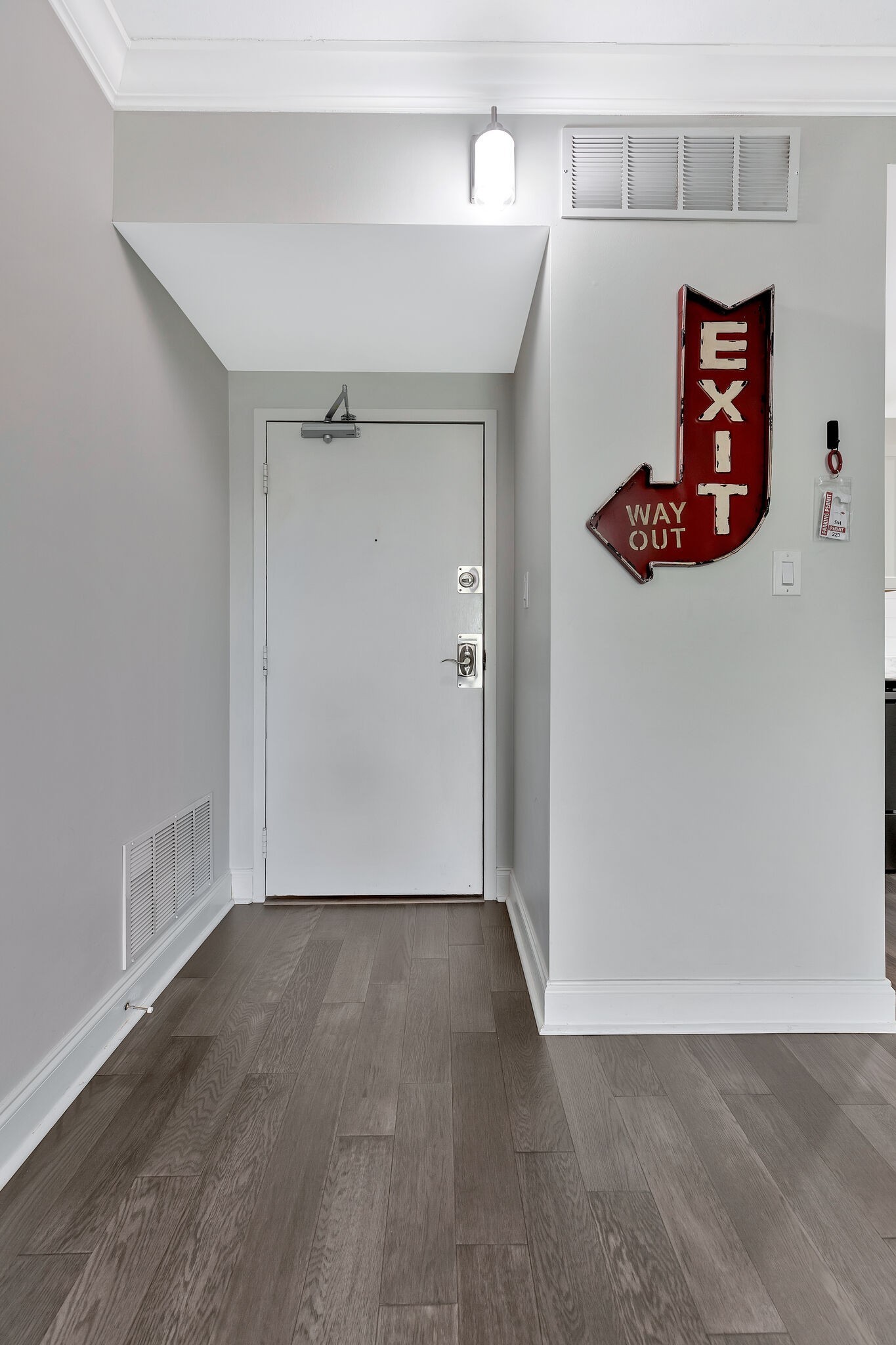 11 Music Square East, Unit 203 Nashville, TN 37203 - Photo 20 of 26 an empty room with wooden floor and closet