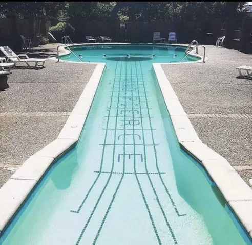 a view of outdoor space with swimming pool