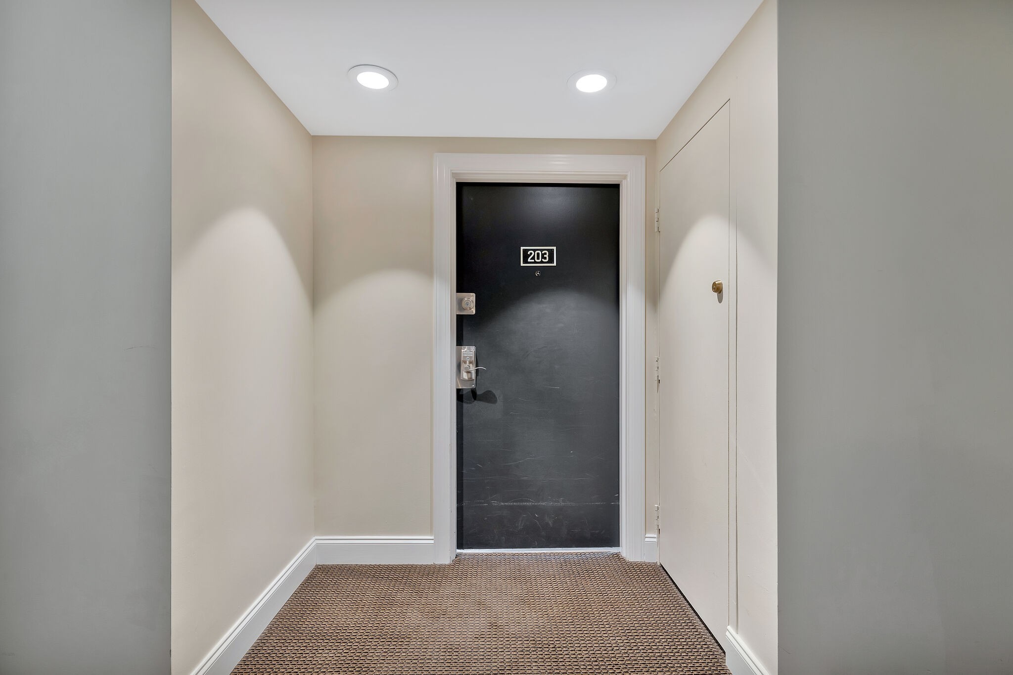 11 Music Square East, Unit 203 Nashville, TN 37203 - Photo 23 of 26 an entryway with wooden floor