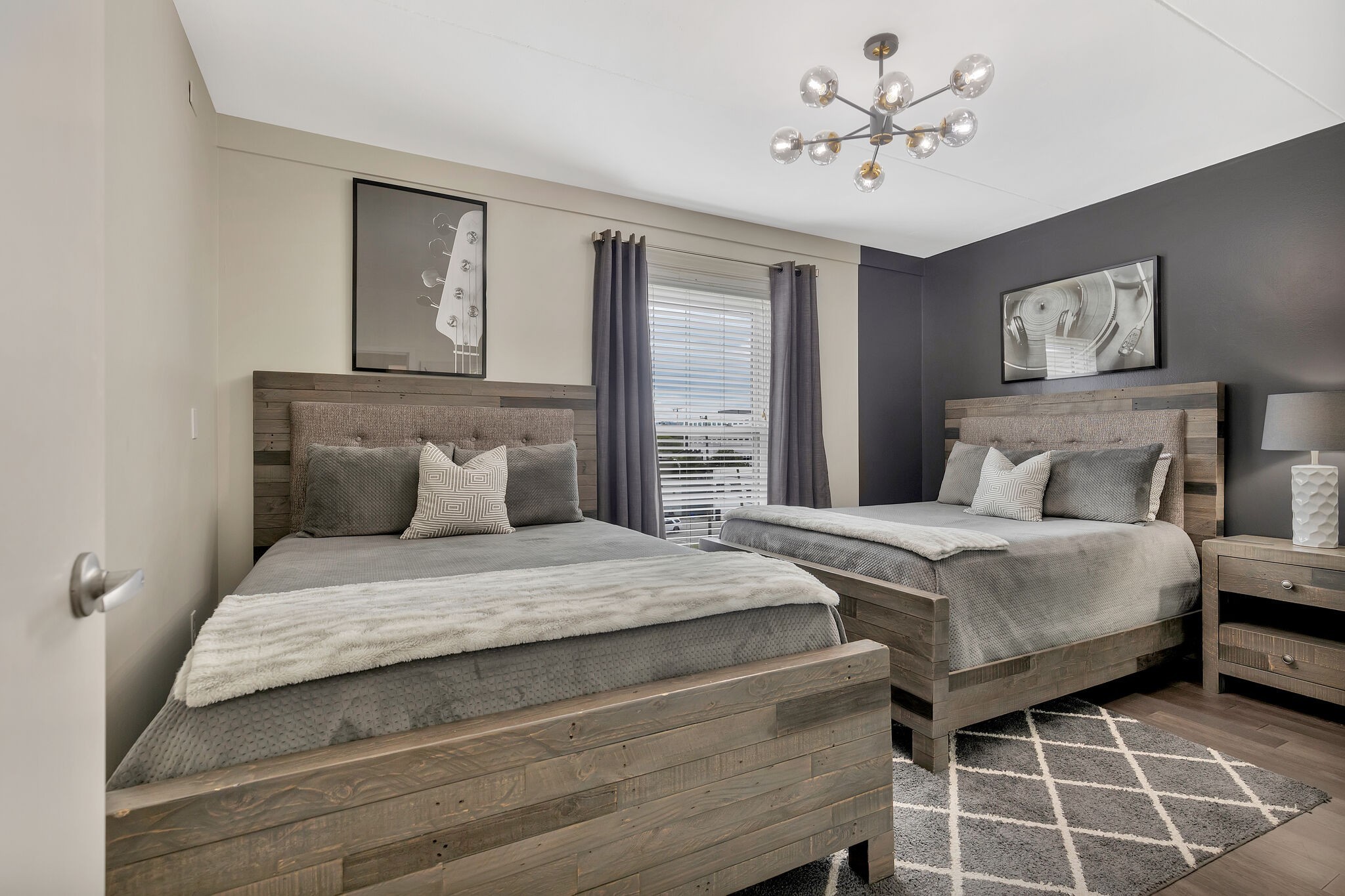 11 Music Square East, Unit 203 Nashville, TN 37203 - Photo 10 of 26 a bedroom with a bed and a window