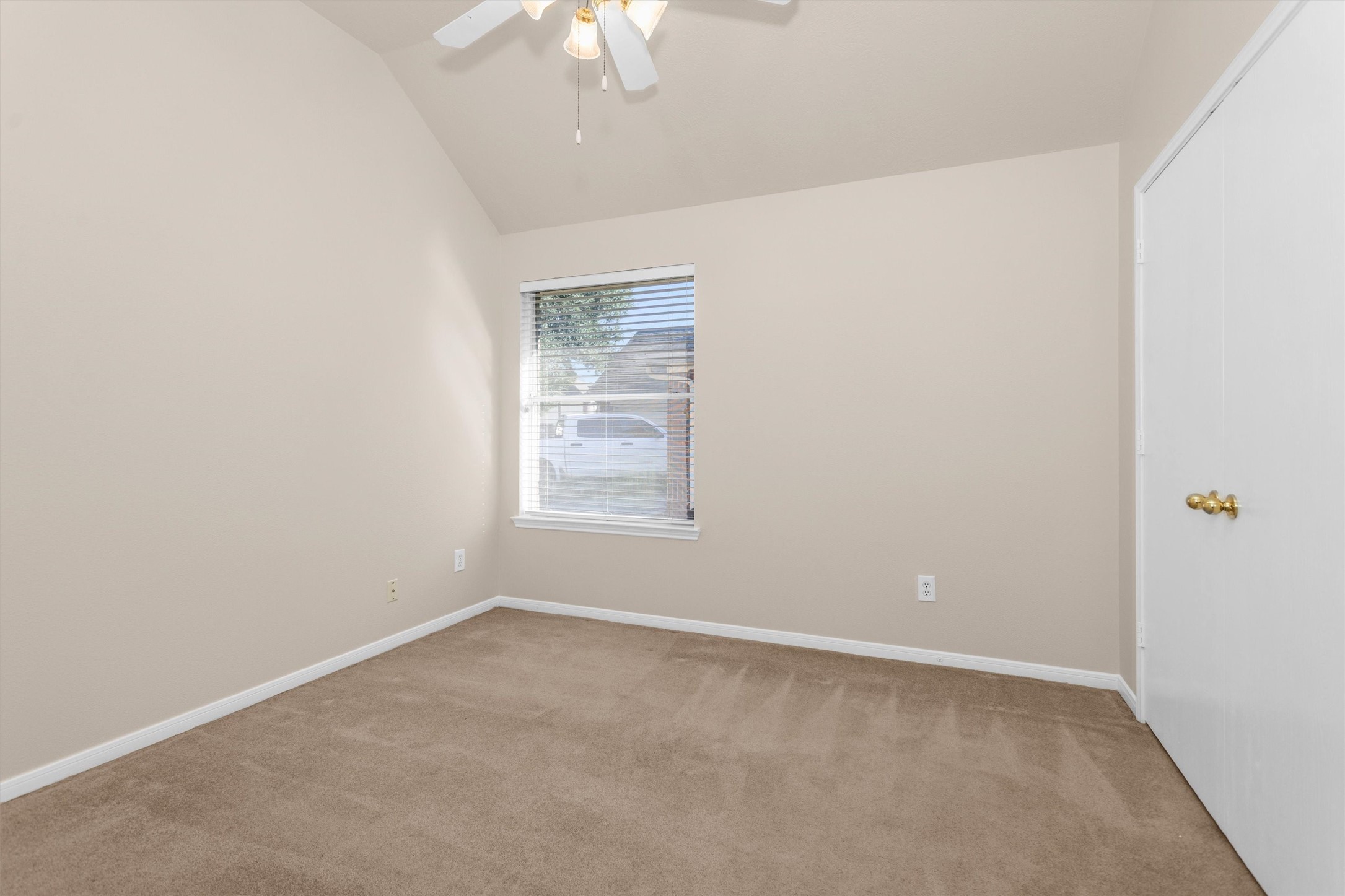 2615 Honeysuckle Walk Spring, TX 77388 - Photo 31 of 39 an empty room with a chandelier fan