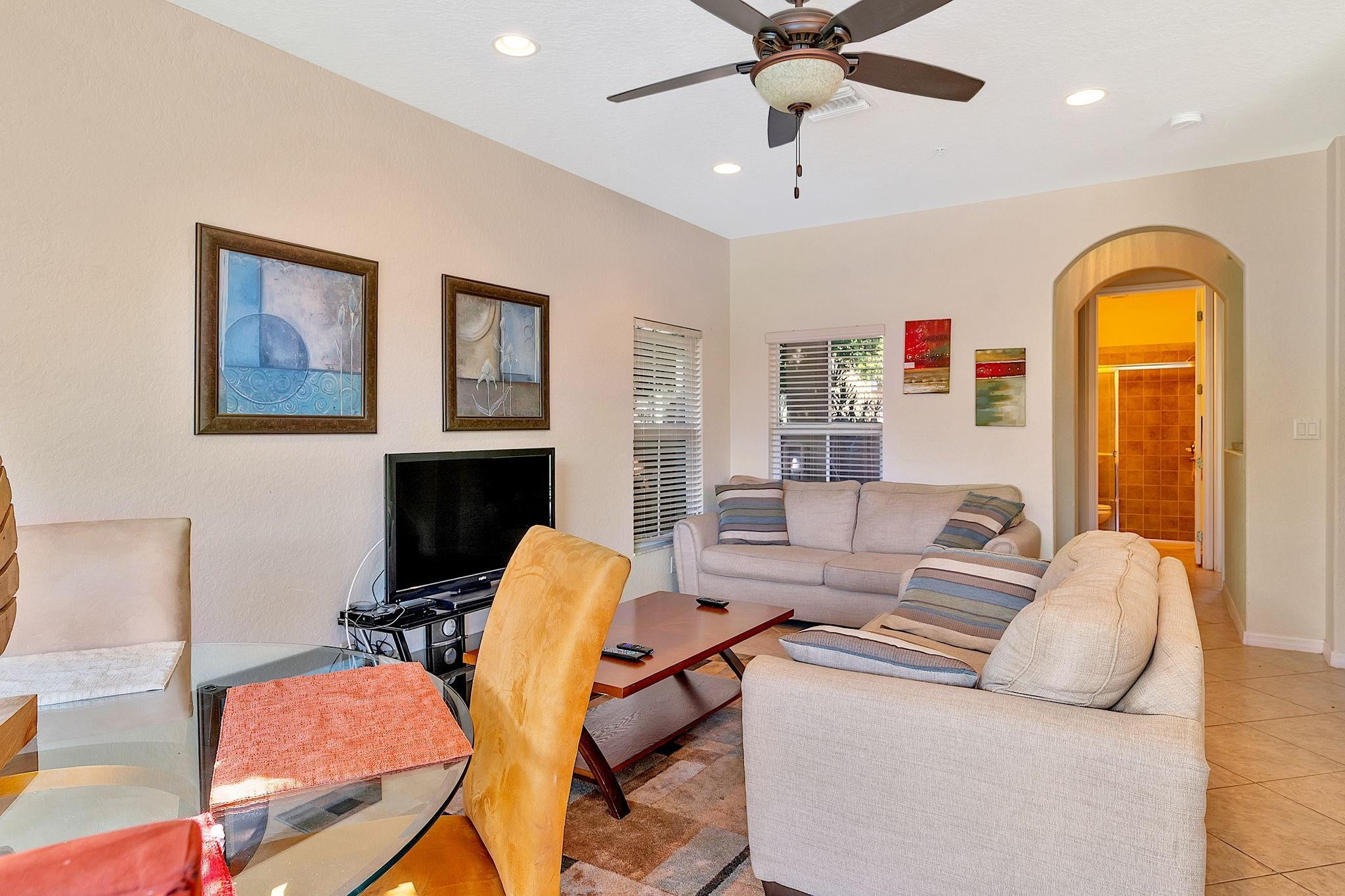 2851 Prospect Road, Unit 1101 Tamarac, FL 33309 - Photo 7 of 49 a living room with furniture and wooden floor