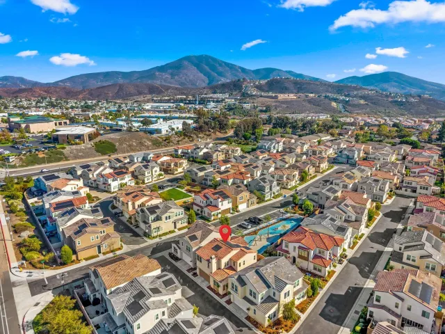 a view of a city with mountains in the background