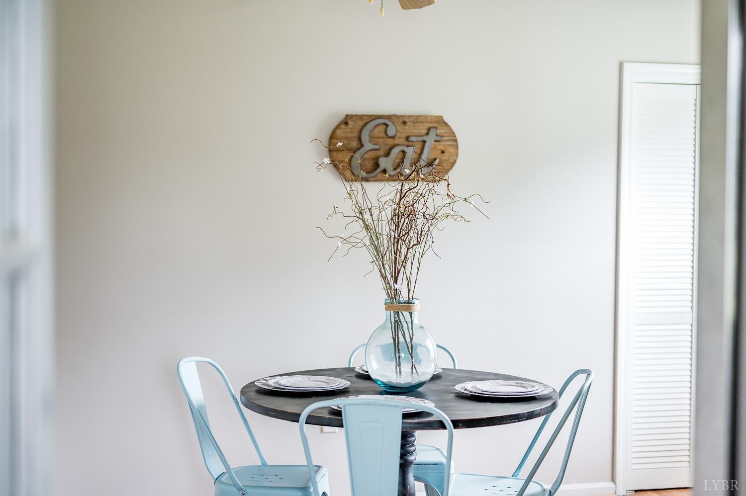 1164 English Tavern Road Rustburg, VA 24588 - Photo 15 of 46 a vase of flowers sitting on a table