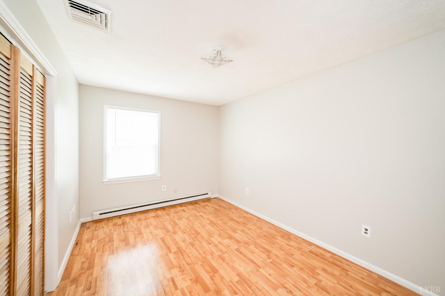 1164 English Tavern Road Rustburg, VA 24588 - Photo 29 of 46 an empty room with a window