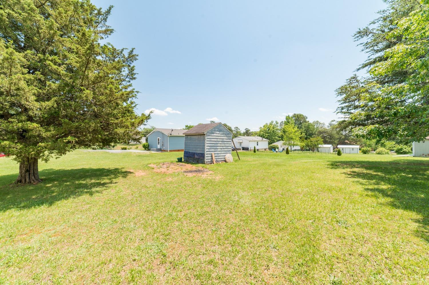 1164 English Tavern Road Rustburg, VA 24588 - Photo 45 of 46 a house view with swimming pool in front of the house