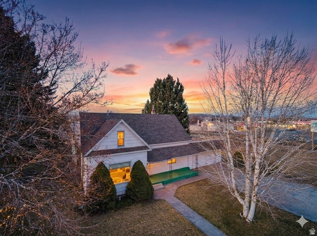 19 North Main Street Levan, UT 84639 - Photo 1 of 1 View of front facade featuring roof with shingles and a yard