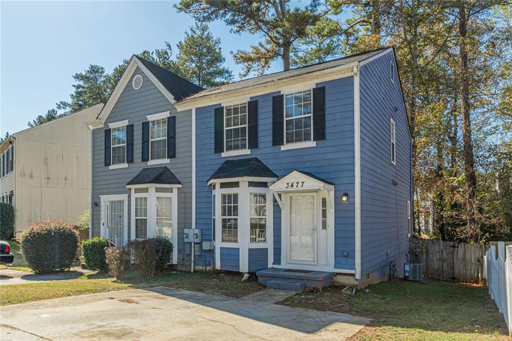 3477 Kingswood Trail Decatur, GA 30034 - Photo 14 of 44 a front view of a house with a yard