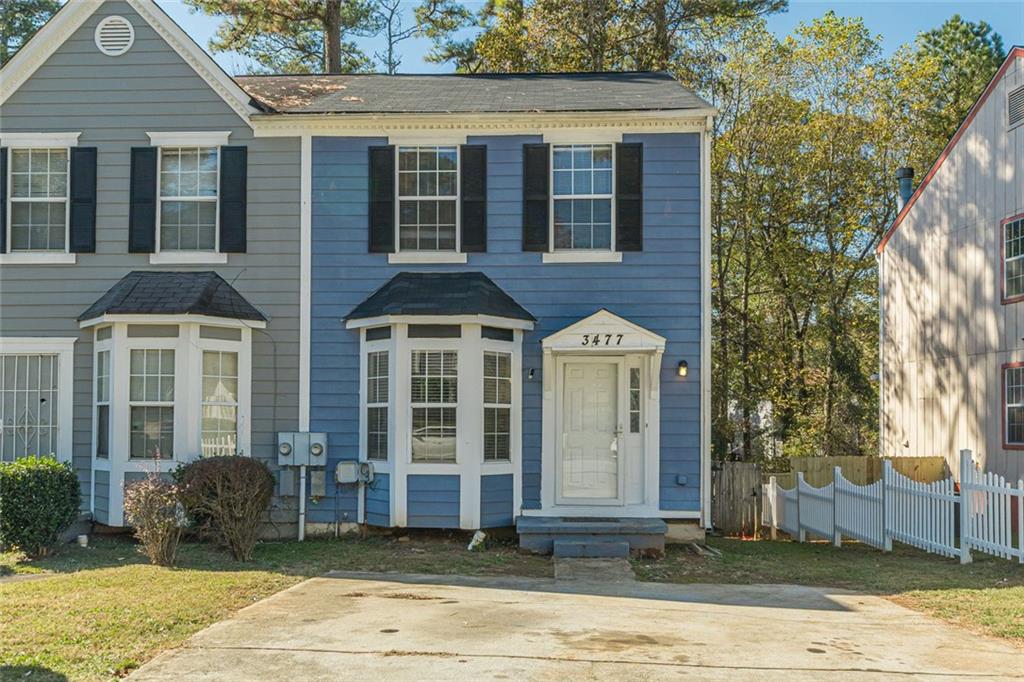 3477 Kingswood Trail Decatur, GA 30034 - Photo 15 of 44 a front view of a house with a yard