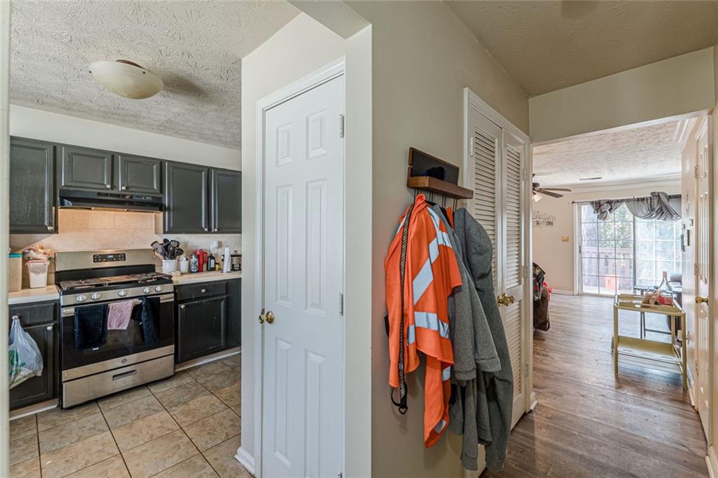 3477 Kingswood Trail Decatur, GA 30034 - Photo 26 of 44 a view of a kitchen with a stove and a refrigerator