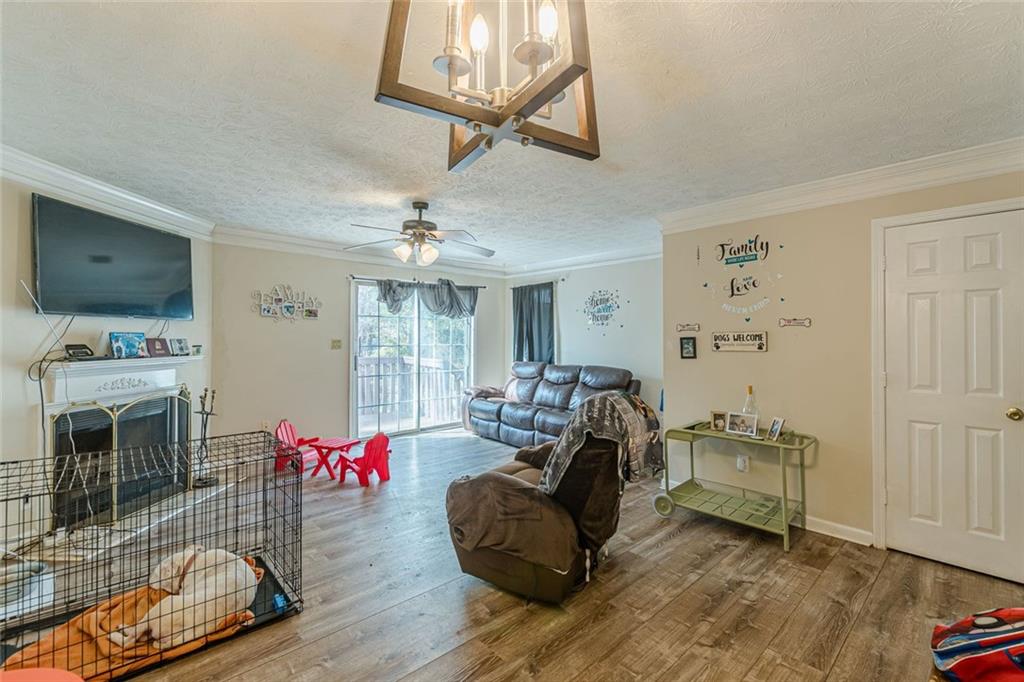 3477 Kingswood Trail Decatur, GA 30034 - Photo 33 of 44 a living room with furniture and a flat screen tv
