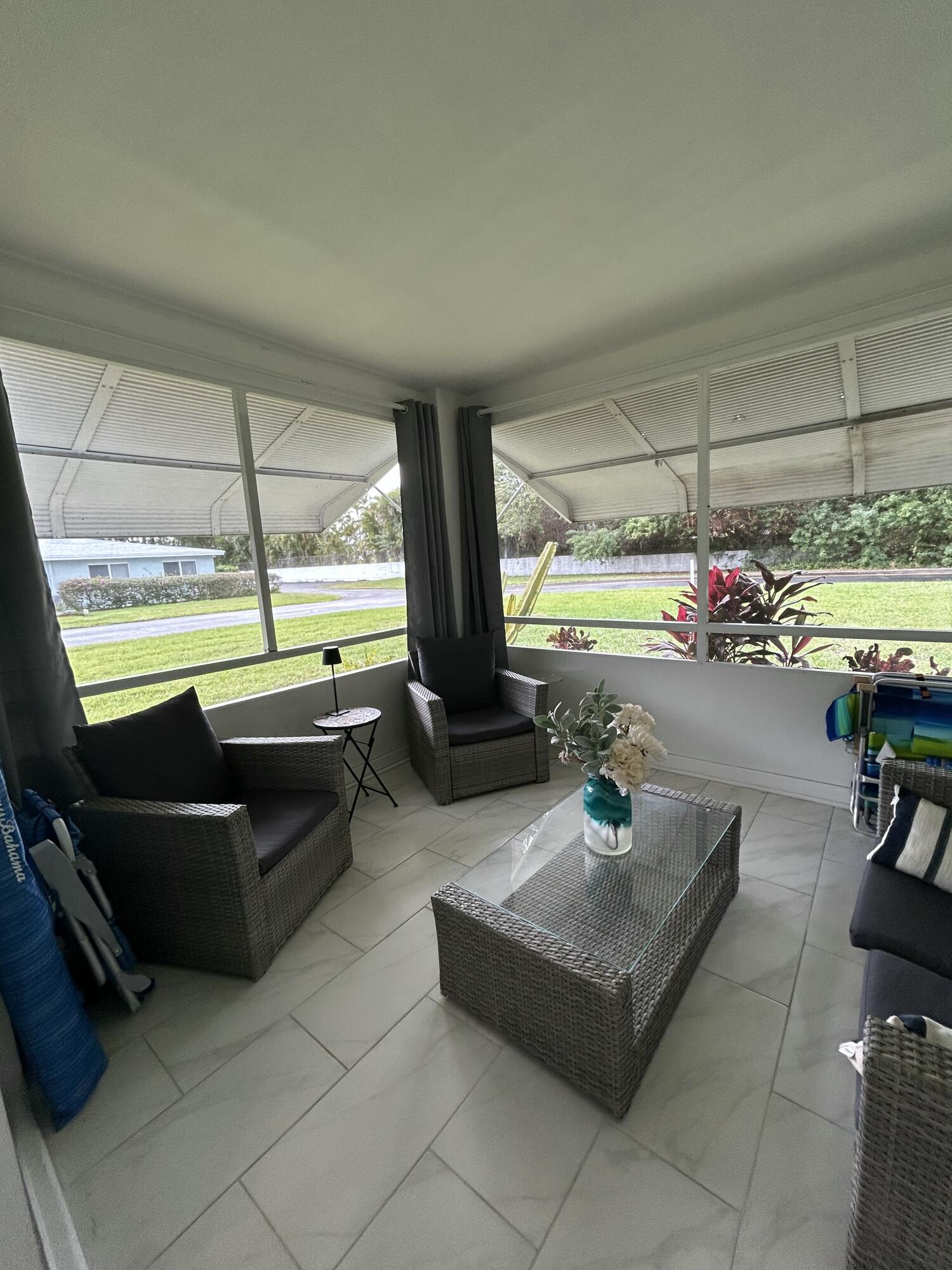 404 High Point Boulevard Delray Beach, FL 33445 - Photo 17 of 18 Screened Patio