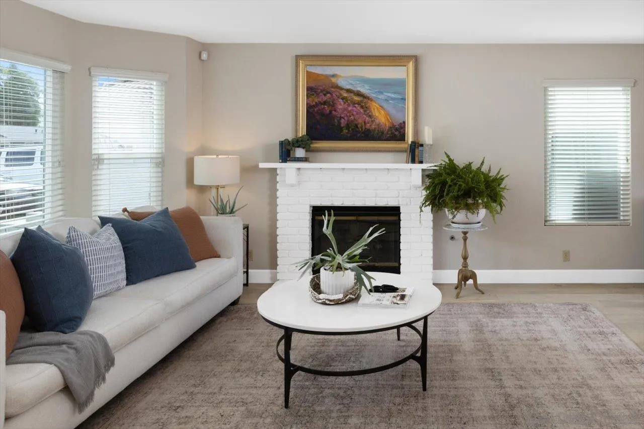 3746 Kelton Drive Oceanside, CA 92056 - Photo 13 of 49 a living room with furniture and a fireplace