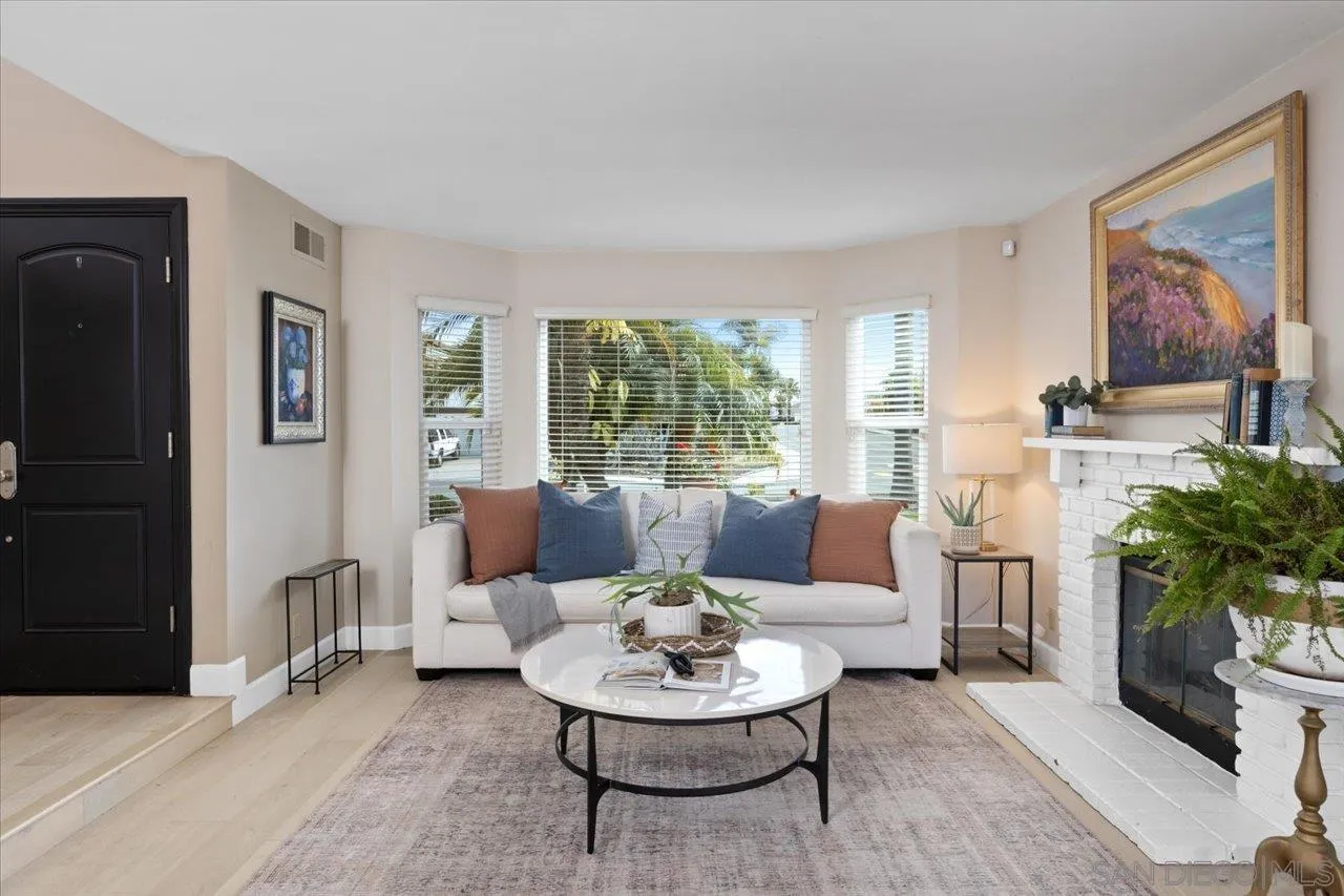 3746 Kelton Drive Oceanside, CA 92056 - Photo 15 of 49 a living room with furniture a potted plant and a large window