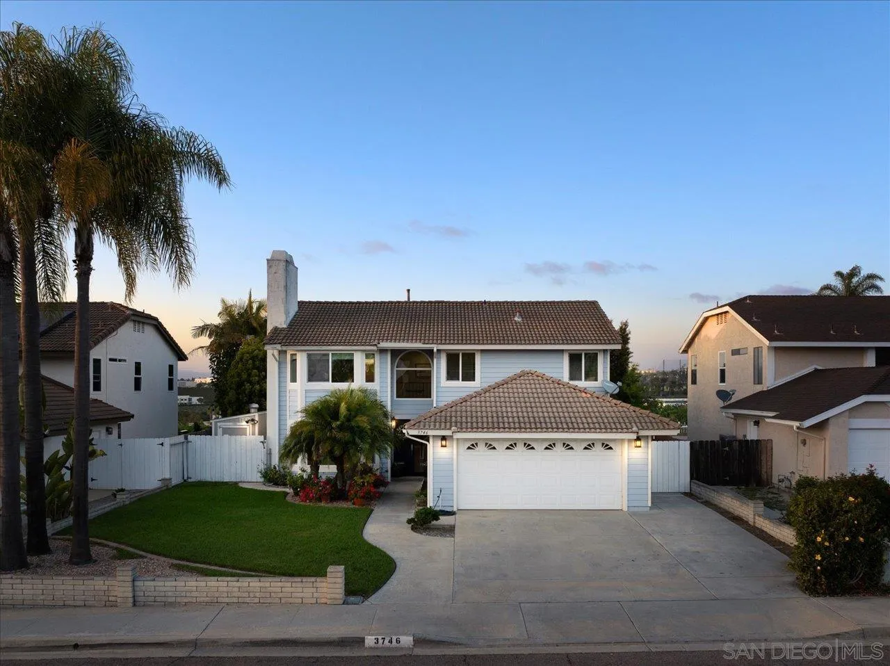 3746 Kelton Drive Oceanside, CA 92056 - Photo 38 of 49 a front view of house with yard and trees around