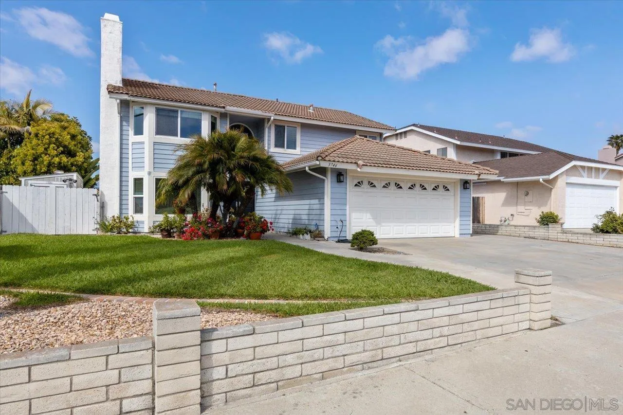 3746 Kelton Drive Oceanside, CA 92056 - Photo 39 of 49 a front view of a house with a yard