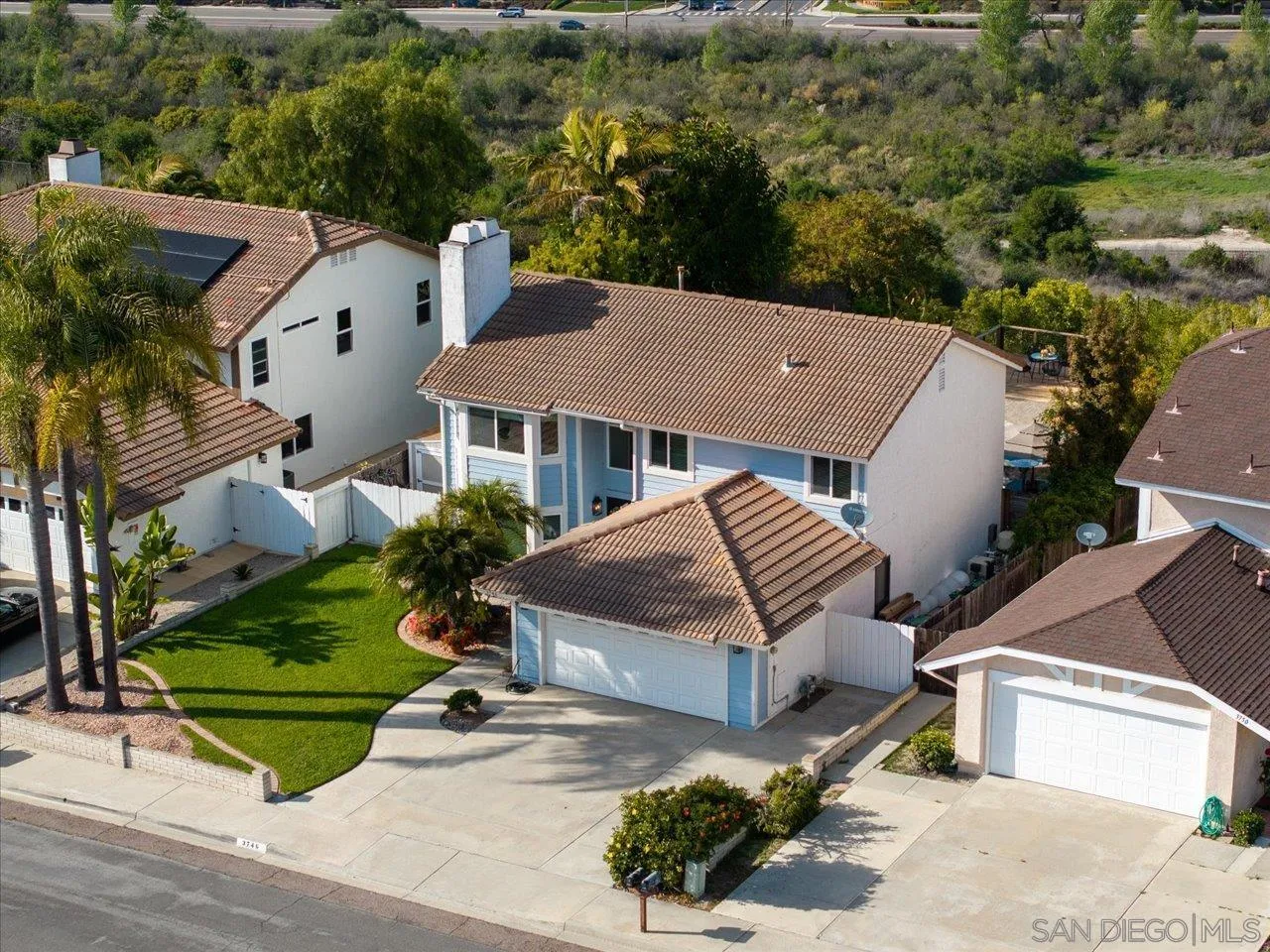 3746 Kelton Drive Oceanside, CA 92056 - Photo 41 of 49 an aerial view of a house with a garden