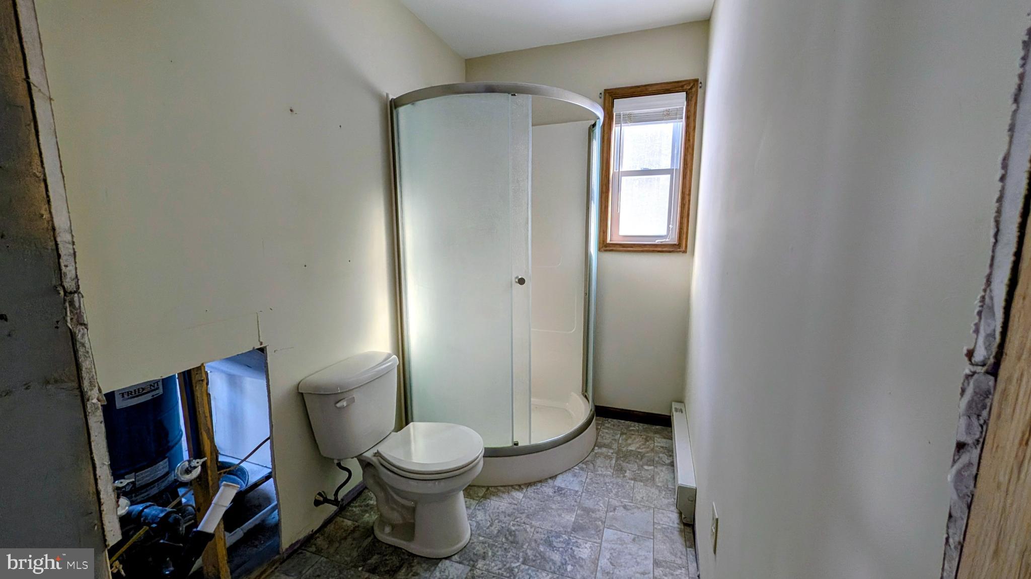 31 Rodda Road Albrightsville, PA 18210 - Photo 12 of 24 a bathroom with a toilet and a shower