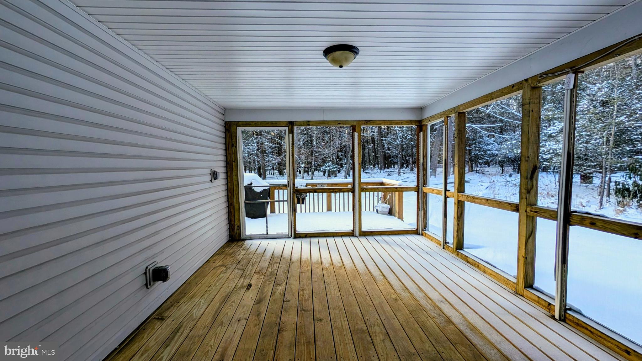 31 Rodda Road Albrightsville, PA 18210 - Photo 13 of 24 a view of balcony with wooden floor