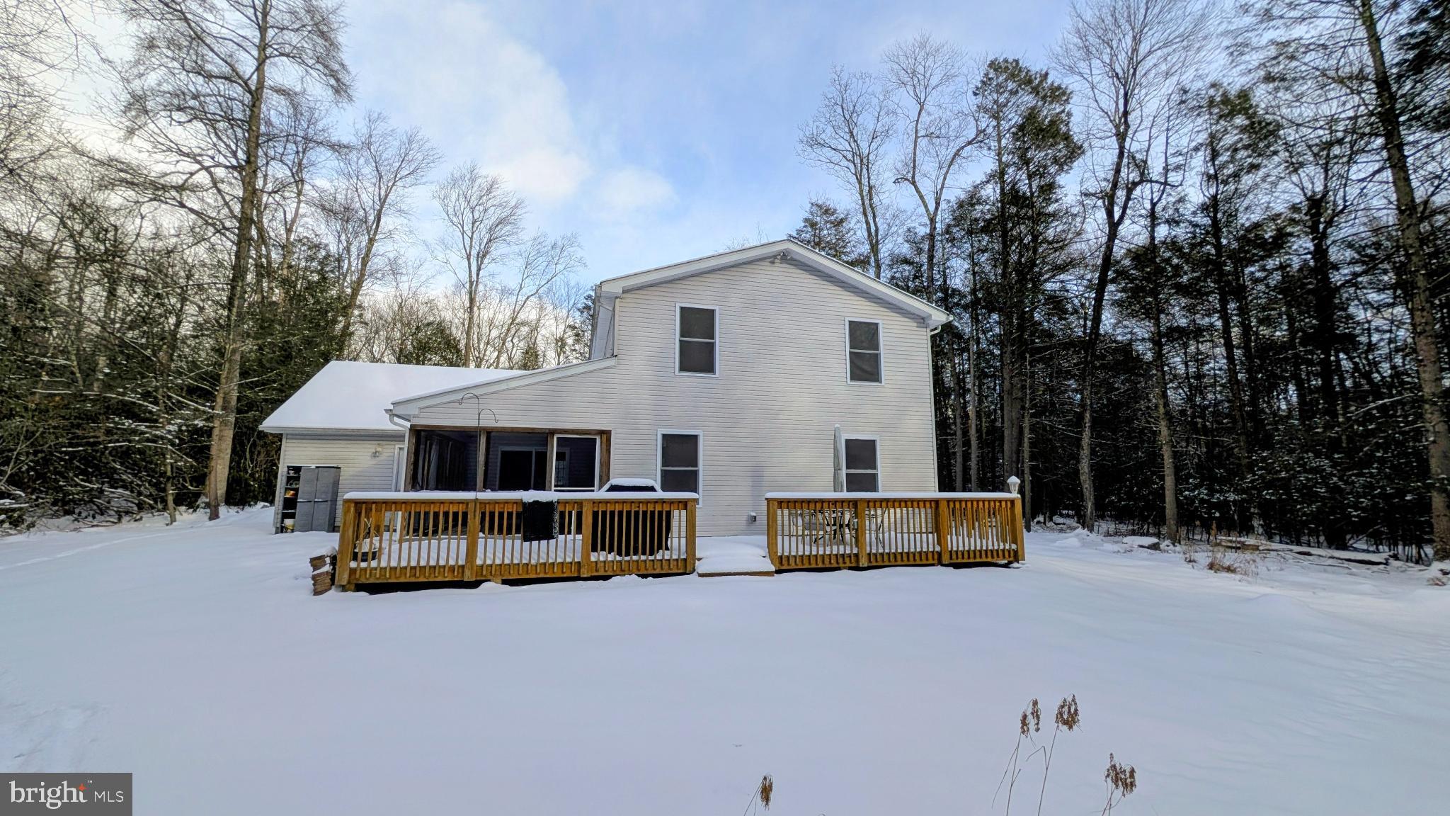 31 Rodda Road Albrightsville, PA 18210 - Photo 21 of 24 a view of house with outdoor space and swimming pool