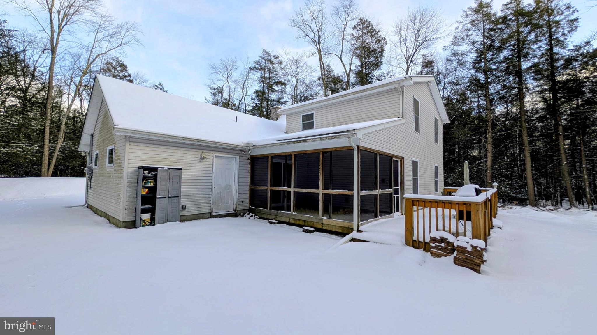 31 Rodda Road Albrightsville, PA 18210 - Photo 23 of 24 a view of a house with a large trees and a window